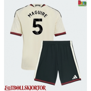 Manchester United Harry Maguire #5 Tredje Kläder Barn 2026-27 Kortärmad (+ Korta byxor)